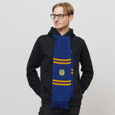 A scarf with an embroidered coat of arms of the university