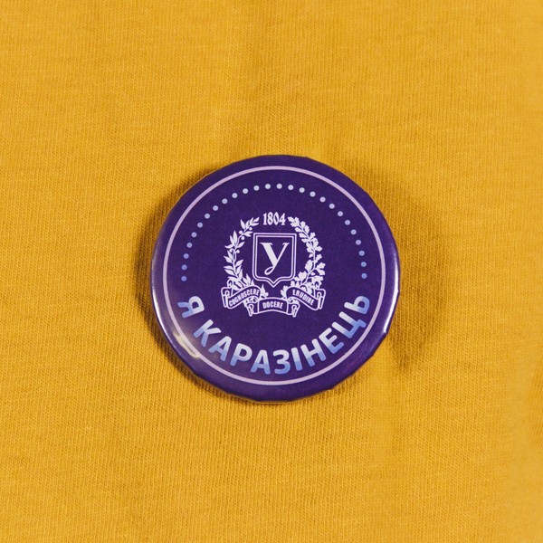 Pin badge with the emblem of the University “I AM A KARAZINITE”